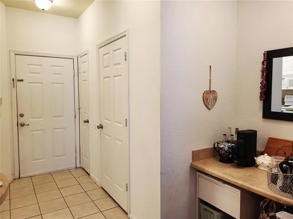 a bathroom with a sink toilet and mirror
