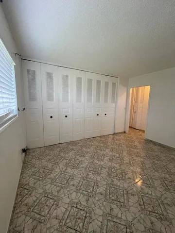 a bathroom with a sink toilet and mirror