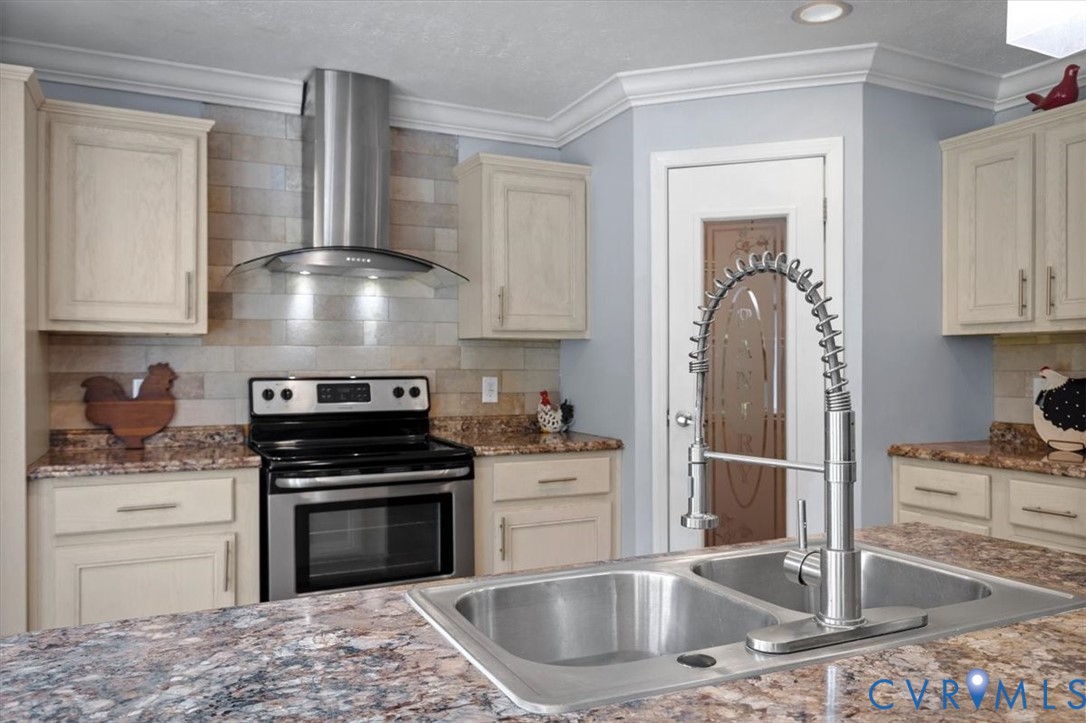 2181 Mill Quarter Road Ford, VA 23850 - Photo 21 of 56 Kitchen featuring light-toned cabinetry, stainless