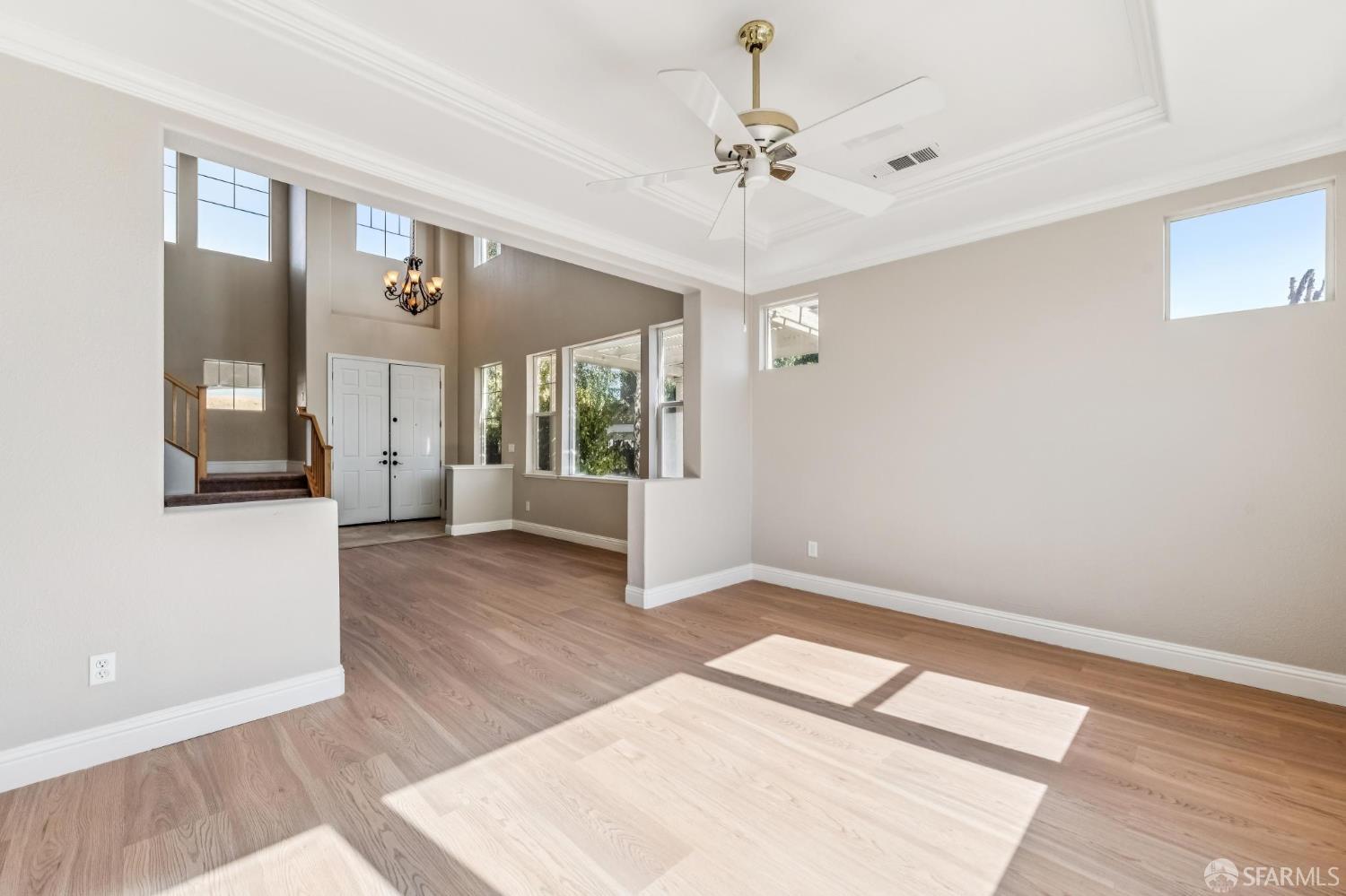 2344 Forty Niner Court Antioch, CA 94531 - Photo 11 of 94 a view of an empty room with wooden floor and a window