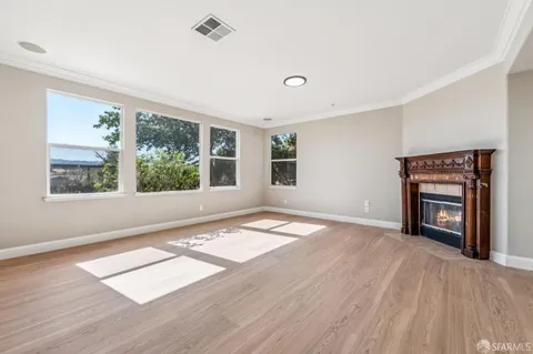 a white bath tub sitting next to a white toilet
