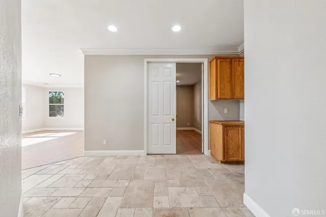 a view of a terrace with couches and city view