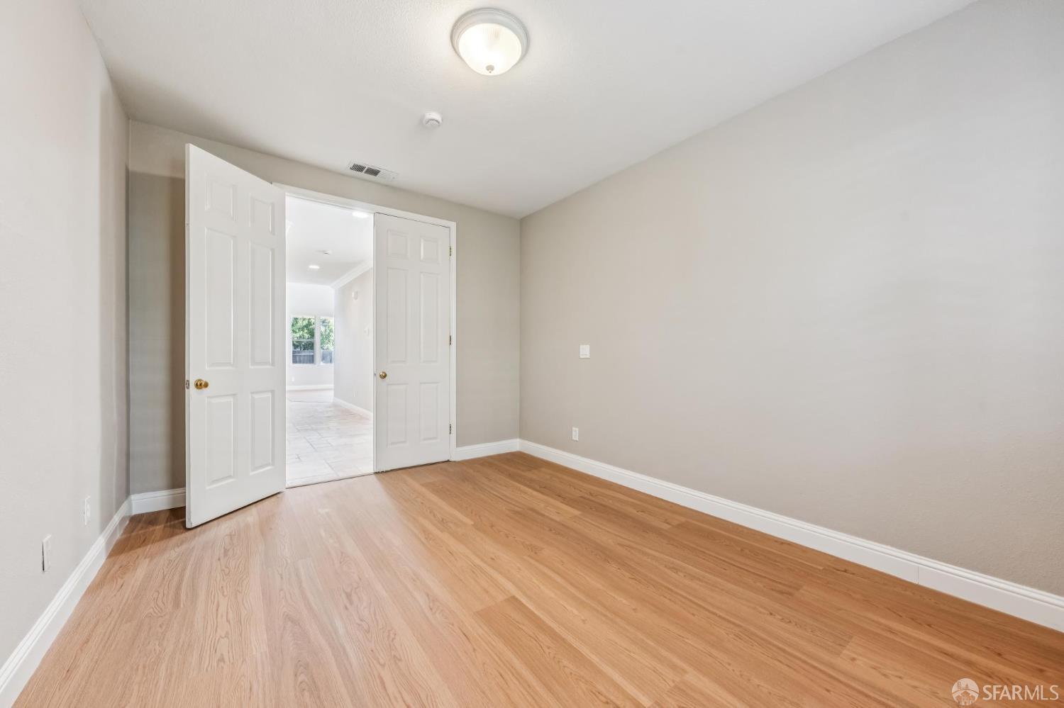 2344 Forty Niner Court Antioch, CA 94531 - Photo 30 of 94 a view of an empty room with wooden floor