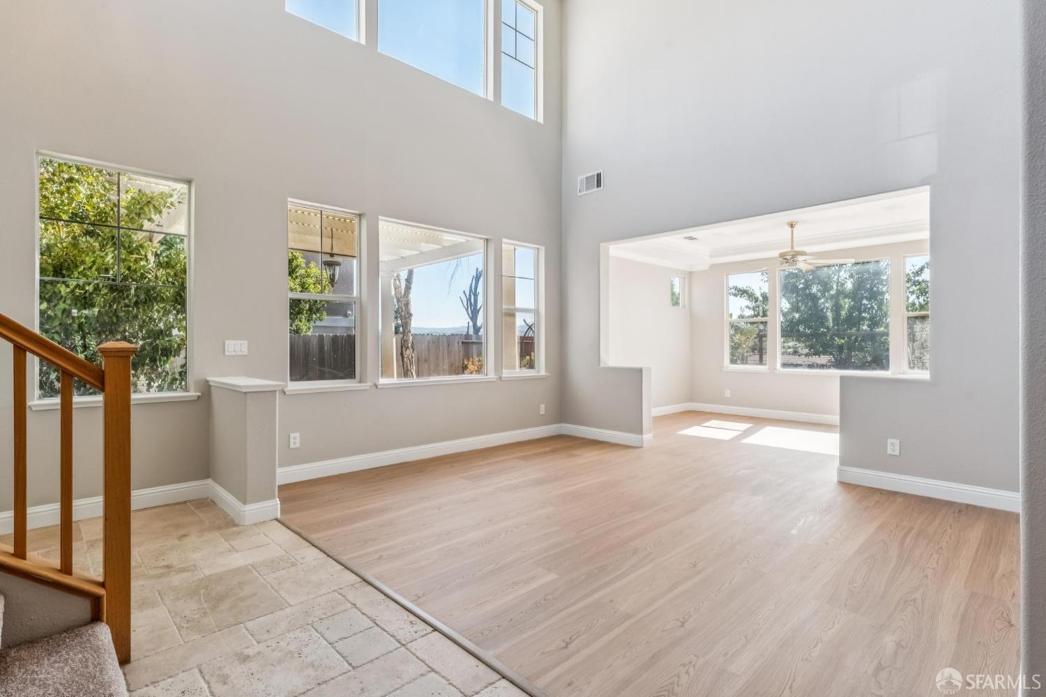 2344 Forty Niner Court Antioch, CA 94531 - Photo 6 of 94 an empty room with wooden floor and windows