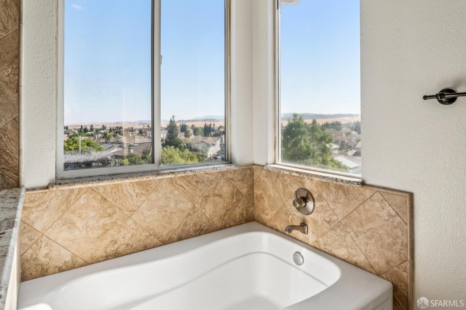 2344 Forty Niner Court Antioch, CA 94531 - Photo 61 of 94 a bath tub sitting next to a window