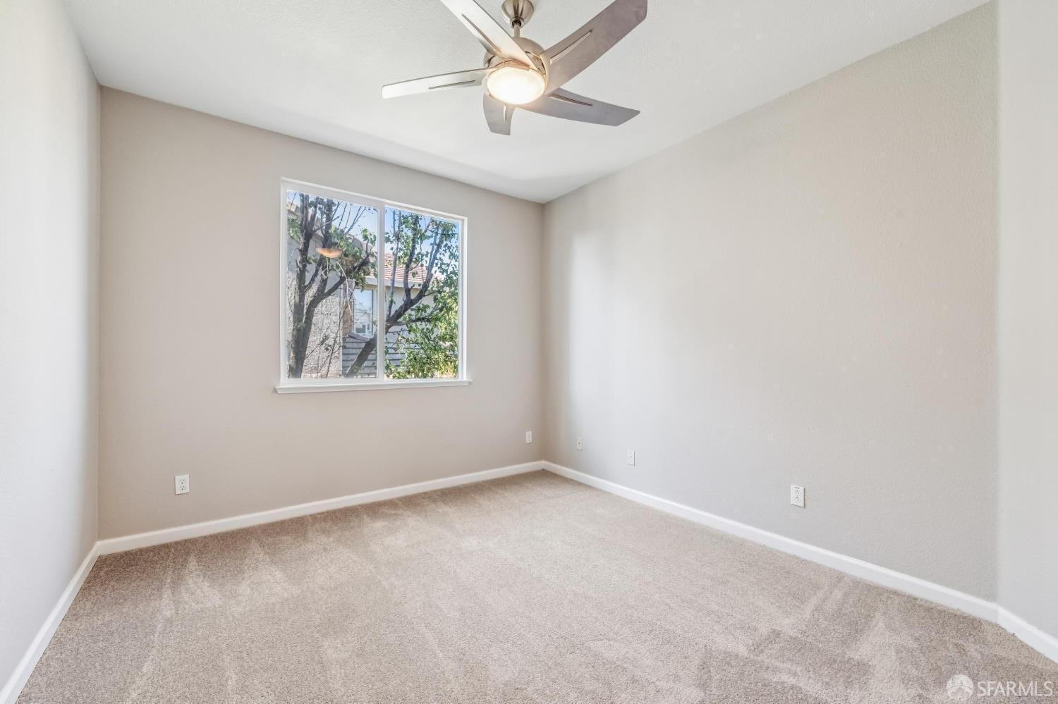 2344 Forty Niner Court Antioch, CA 94531 - Photo 66 of 94 an empty room with windows and fan