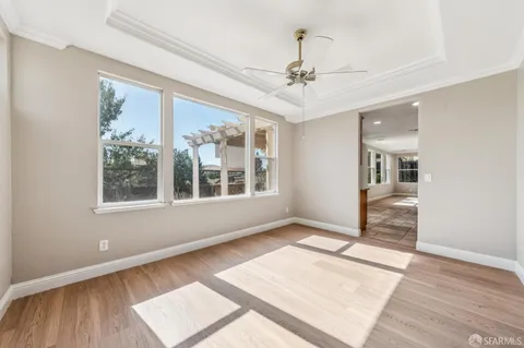 a large kitchen with stainless steel appliances granite countertop a large counter top and a stove