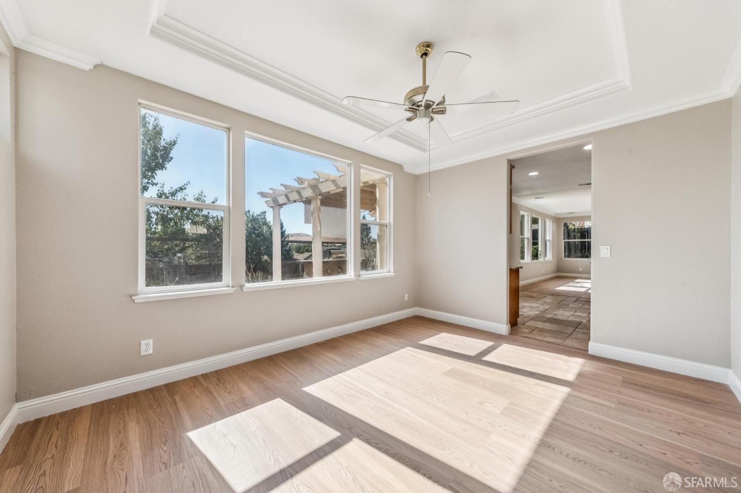 2344 Forty Niner Court Antioch, CA 94531 - Photo 9 of 94 a view of an empty room with wooden floor and a window