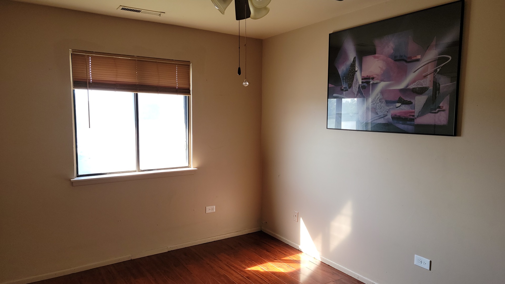14621 Greenwood Road, Unit 408 Dolton, IL 60419 - Photo 15 of 25 an empty room with a window