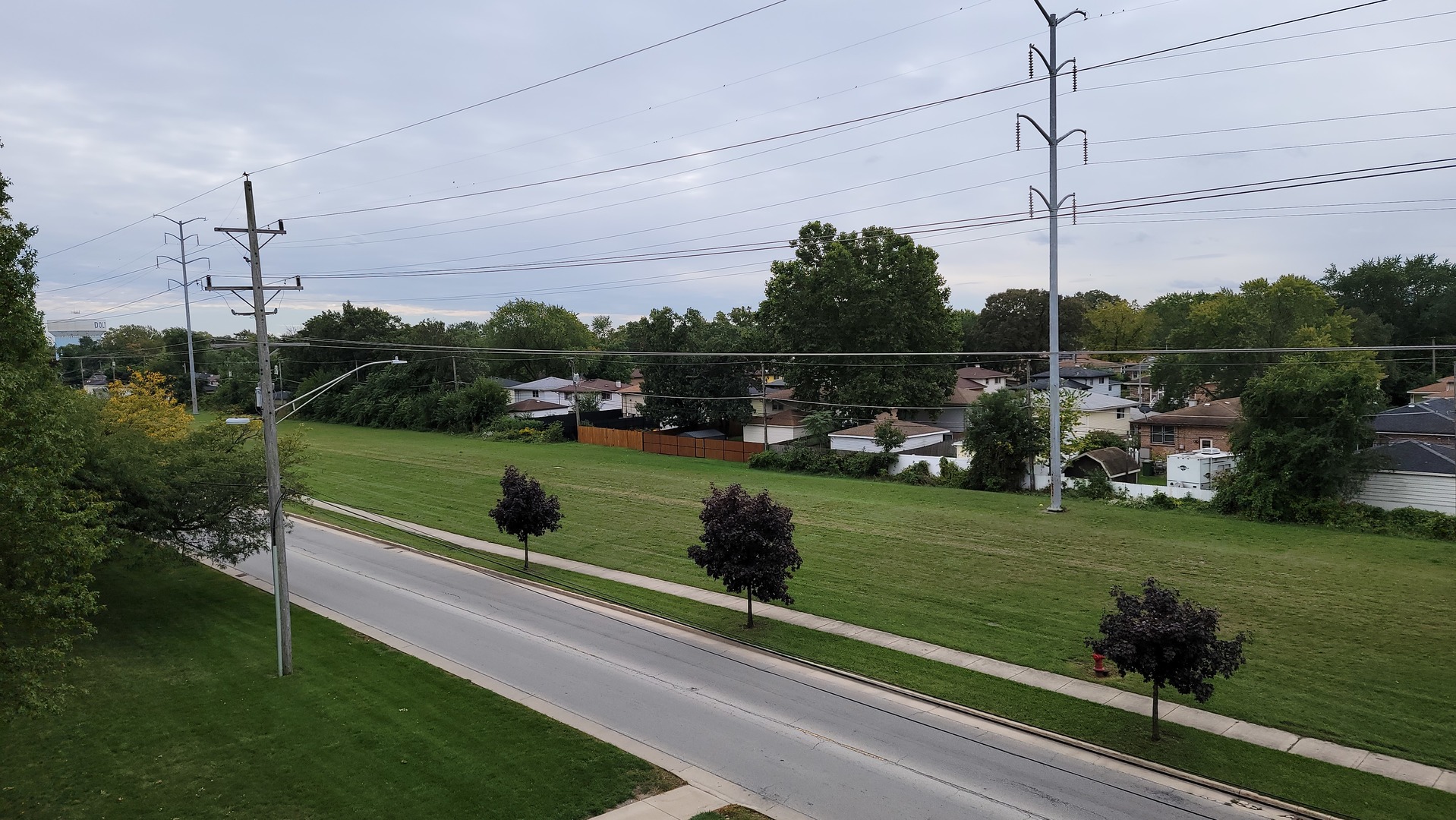 14621 Greenwood Road, Unit 408 Dolton, IL 60419 - Photo 22 of 25 a view of a garden with a bench