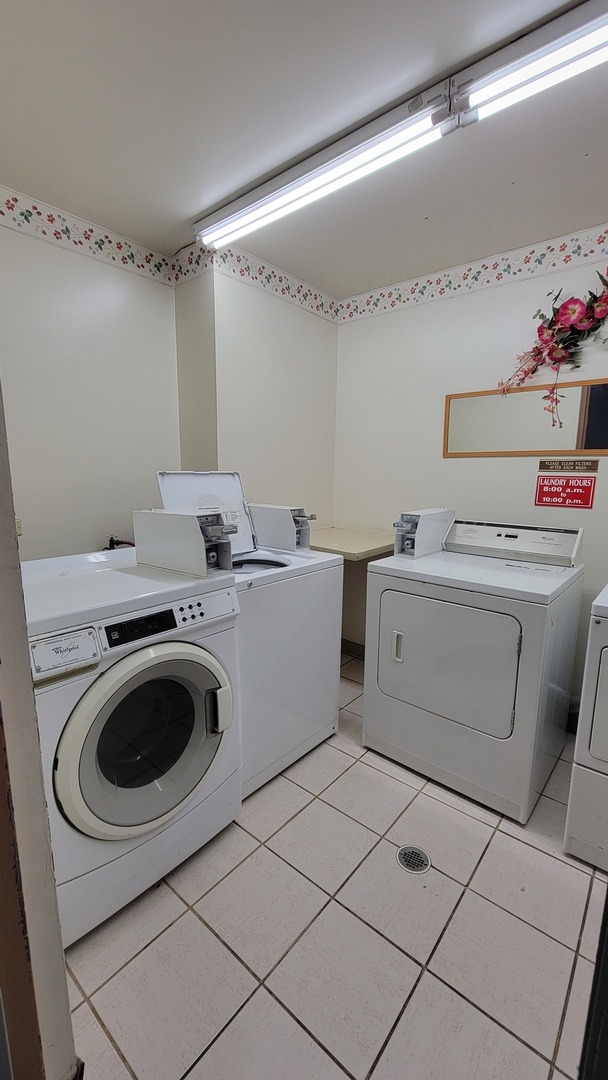 14621 Greenwood Road, Unit 408 Dolton, IL 60419 - Photo 23 of 25 a utility room with dryer and washer