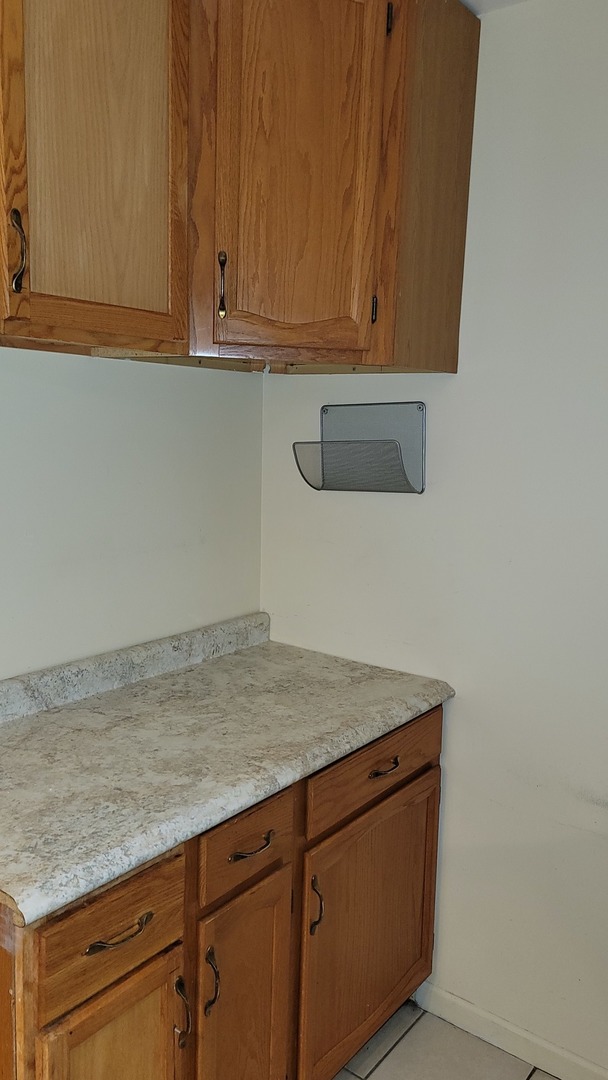 14621 Greenwood Road, Unit 408 Dolton, IL 60419 - Photo 9 of 25 a view of storage and utility room