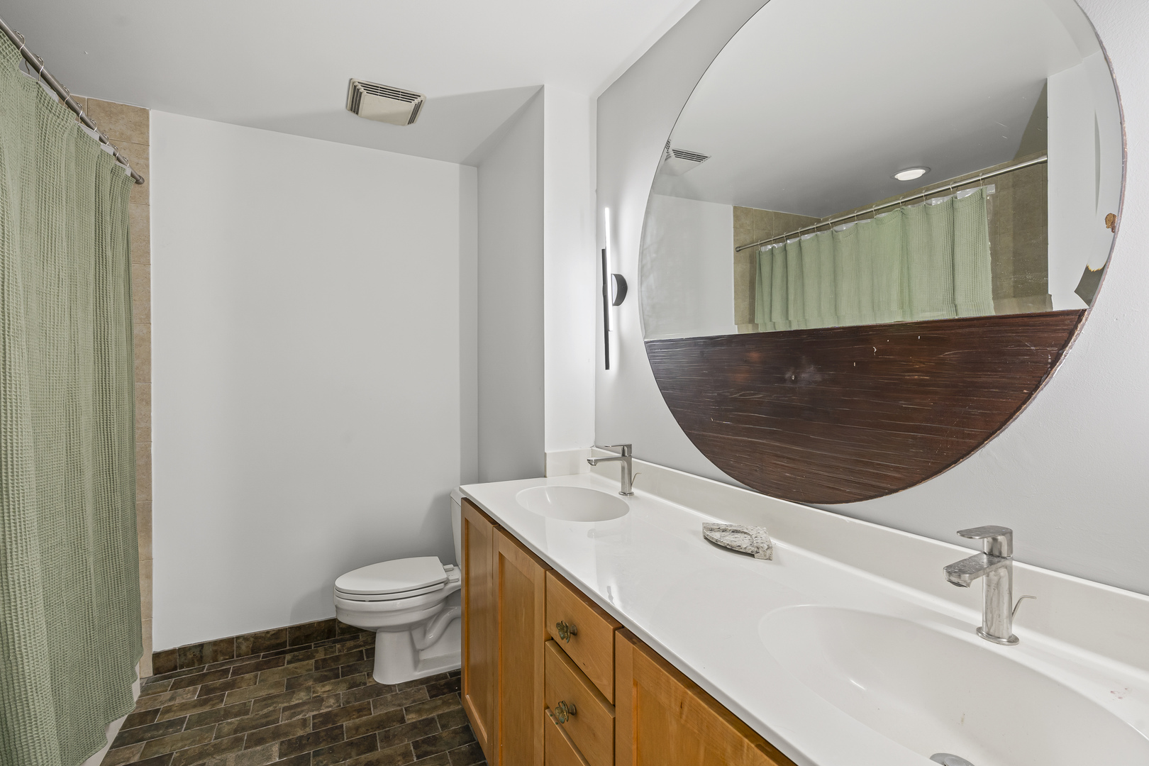1070 West 15th Street, Unit 147 Chicago, IL 60608 - Photo 13 of 17 a bathroom with a sink toilet and shower