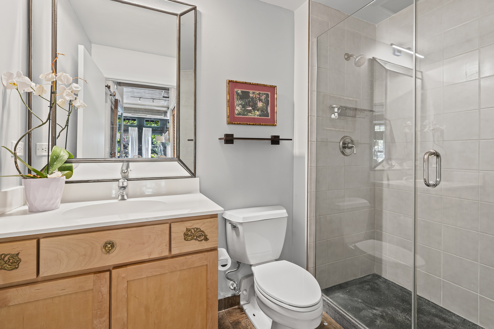 1070 West 15th Street, Unit 147 Chicago, IL 60608 - Photo 10 of 17 a bathroom with a sink a toilet and shower