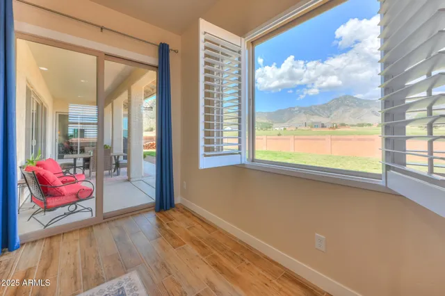 a view of an empty room and window