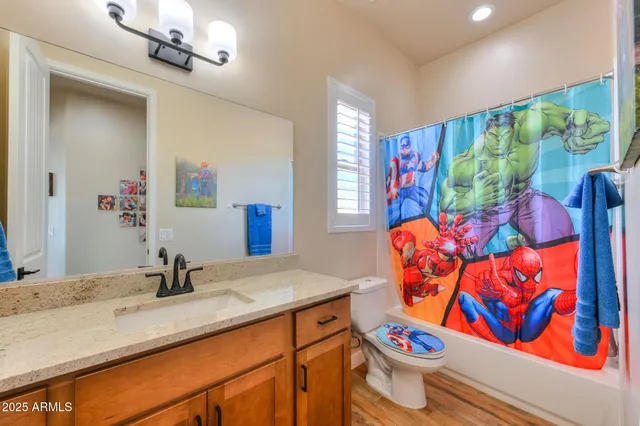 a bedroom with a bed and a window in it