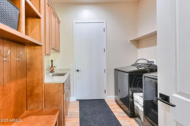 a view of a patio with lawn chairs floor to ceiling window and an outdoor space