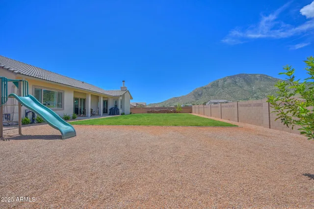 a front view of a building with parking
