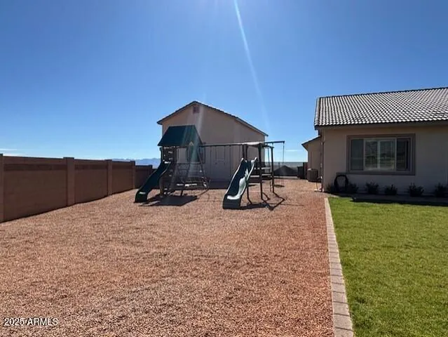 a view of a kitchen with a sink and dishwasher