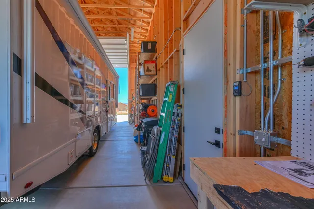 a view of a house with a snow in the background