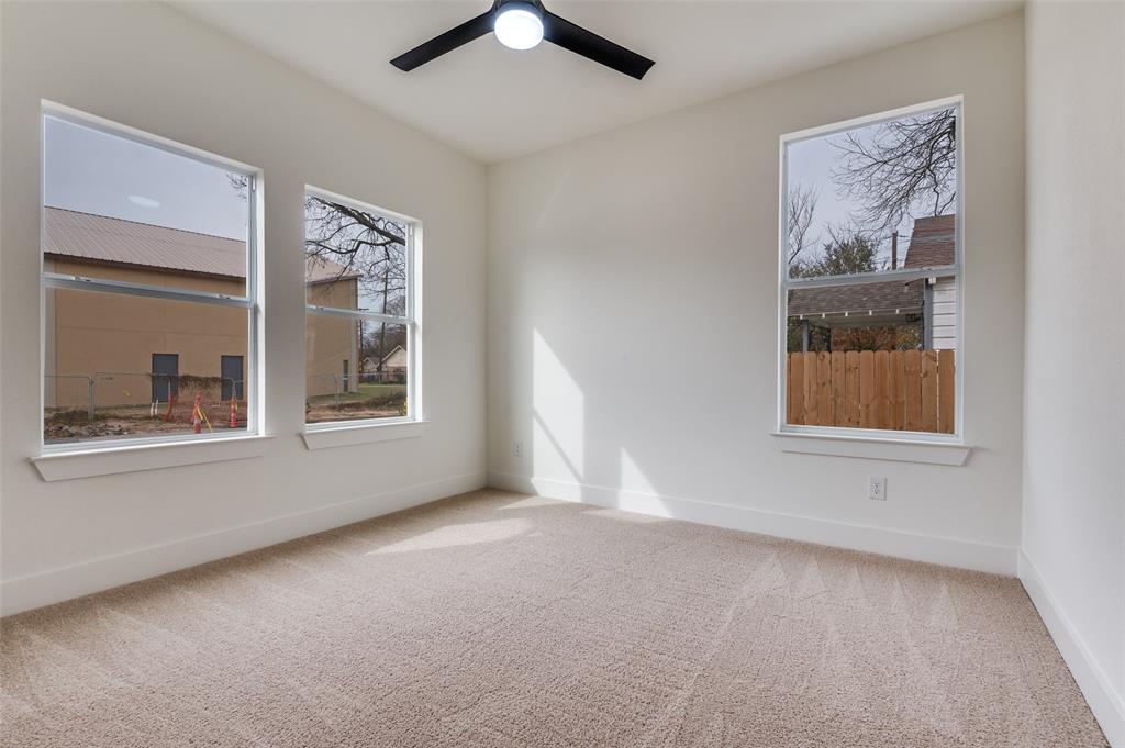 3608 Latimer Street Dallas, TX 75215 - Photo 8 of 15 an empty room with windows and closet