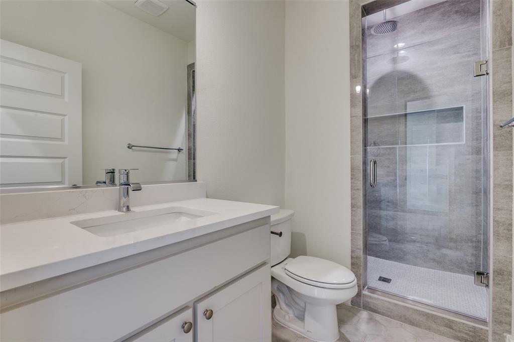 3608 Latimer Street Dallas, TX 75215 - Photo 9 of 15 a bathroom with a sink toilet and shower