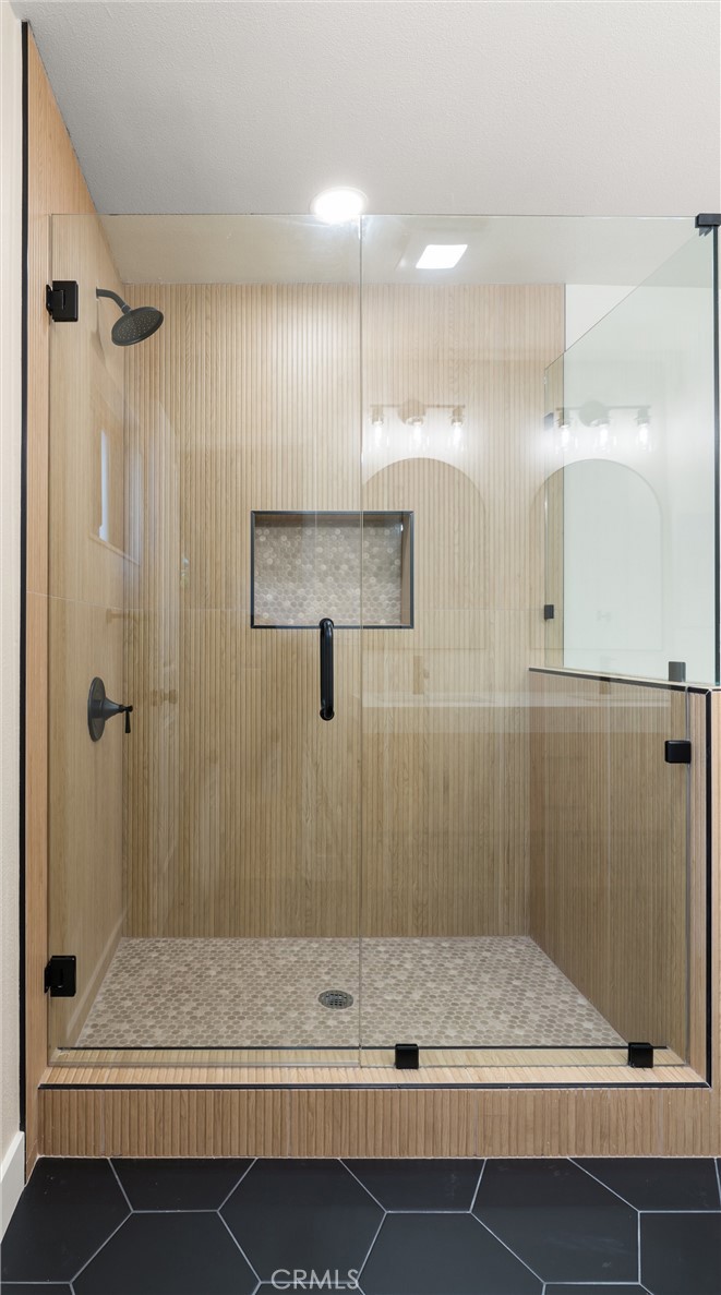 13562 Springdale Street Westminster, CA 92683 - Photo 24 of 34 a bathroom with a shower