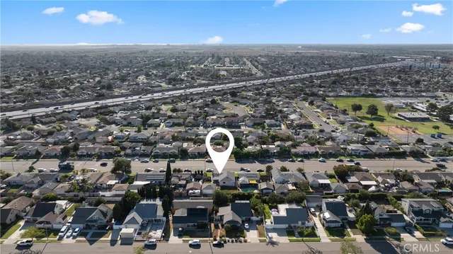 an aerial view of a city with lots of residential buildings