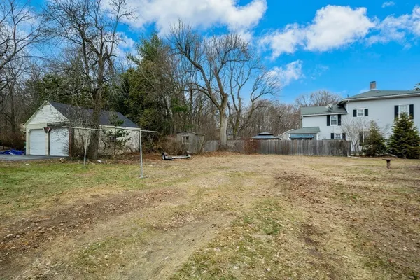 a view of a house with a big yard