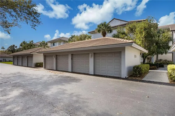 a front view of a house with a garage