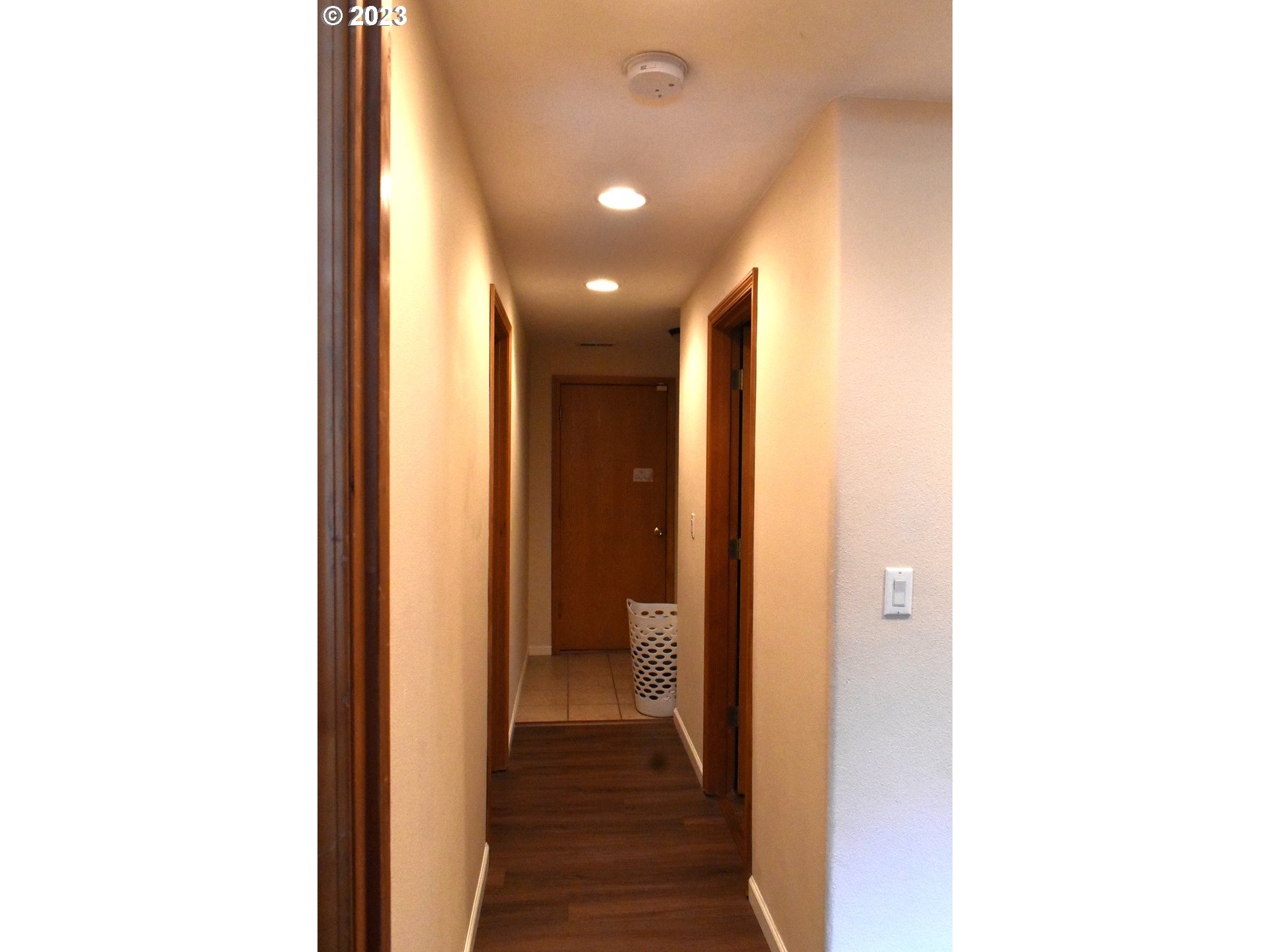 1399 North Shepherd Road Washougal, WA 98671 - Photo 28 of 32 a view of a hallway with wooden floor