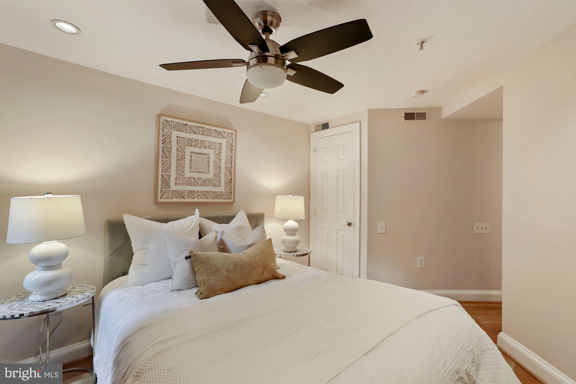 1713 18th Street Northwest, Unit B Washington, DC 20009 - Photo 15 of 23 a large bed in a white room