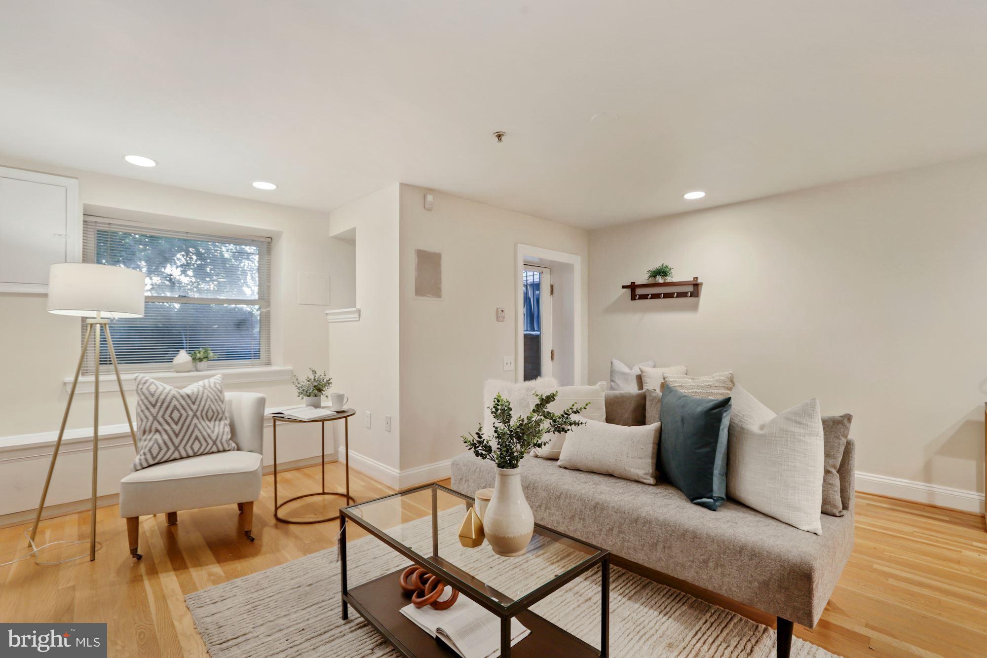 1713 18th Street Northwest, Unit B Washington, DC 20009 - Photo 6 of 23 a living room with furniture and wooden floor