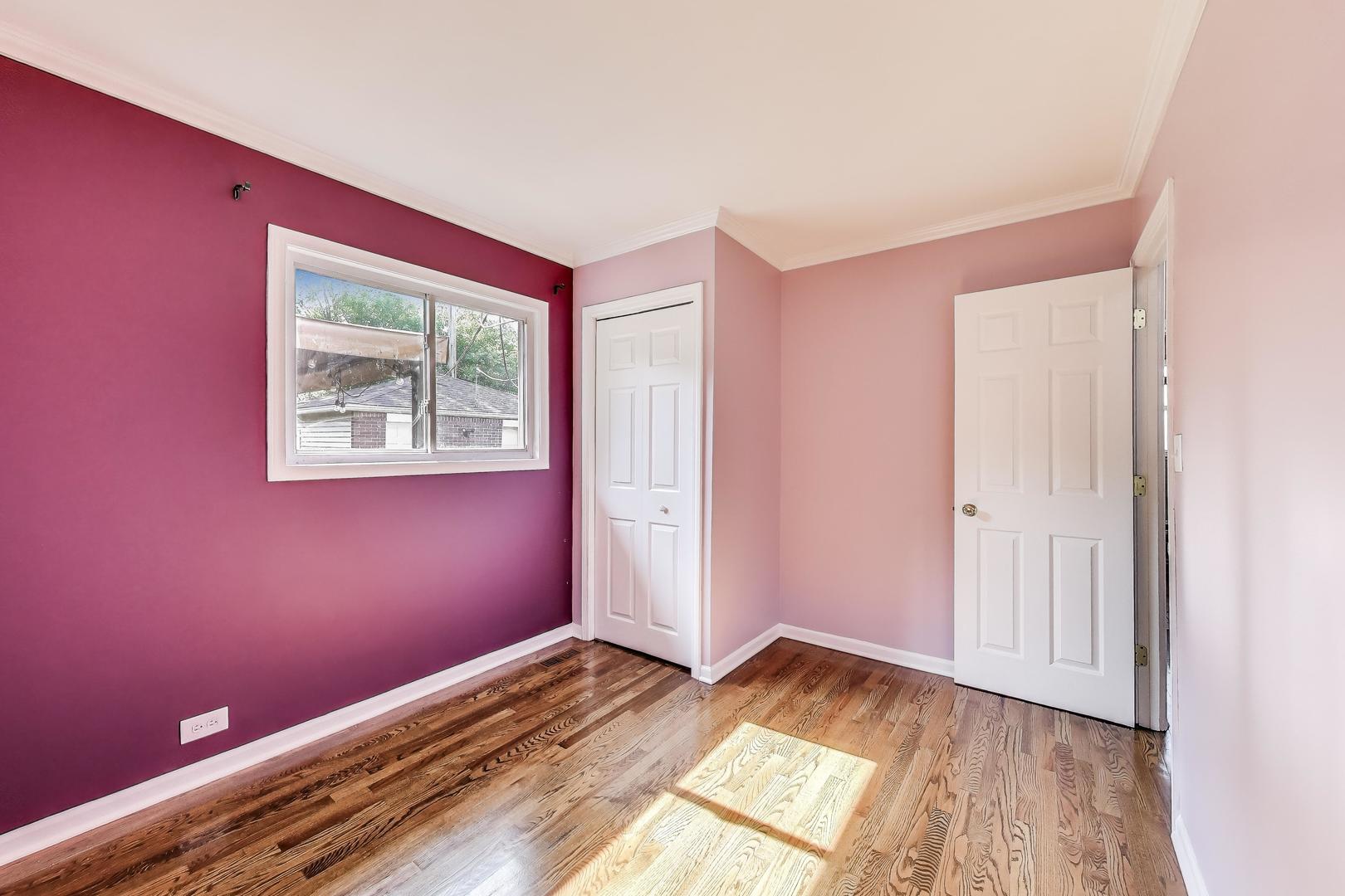 249 George Road Wheeling, IL 60090 - Photo 18 of 33 a view of a room with wooden floor and window