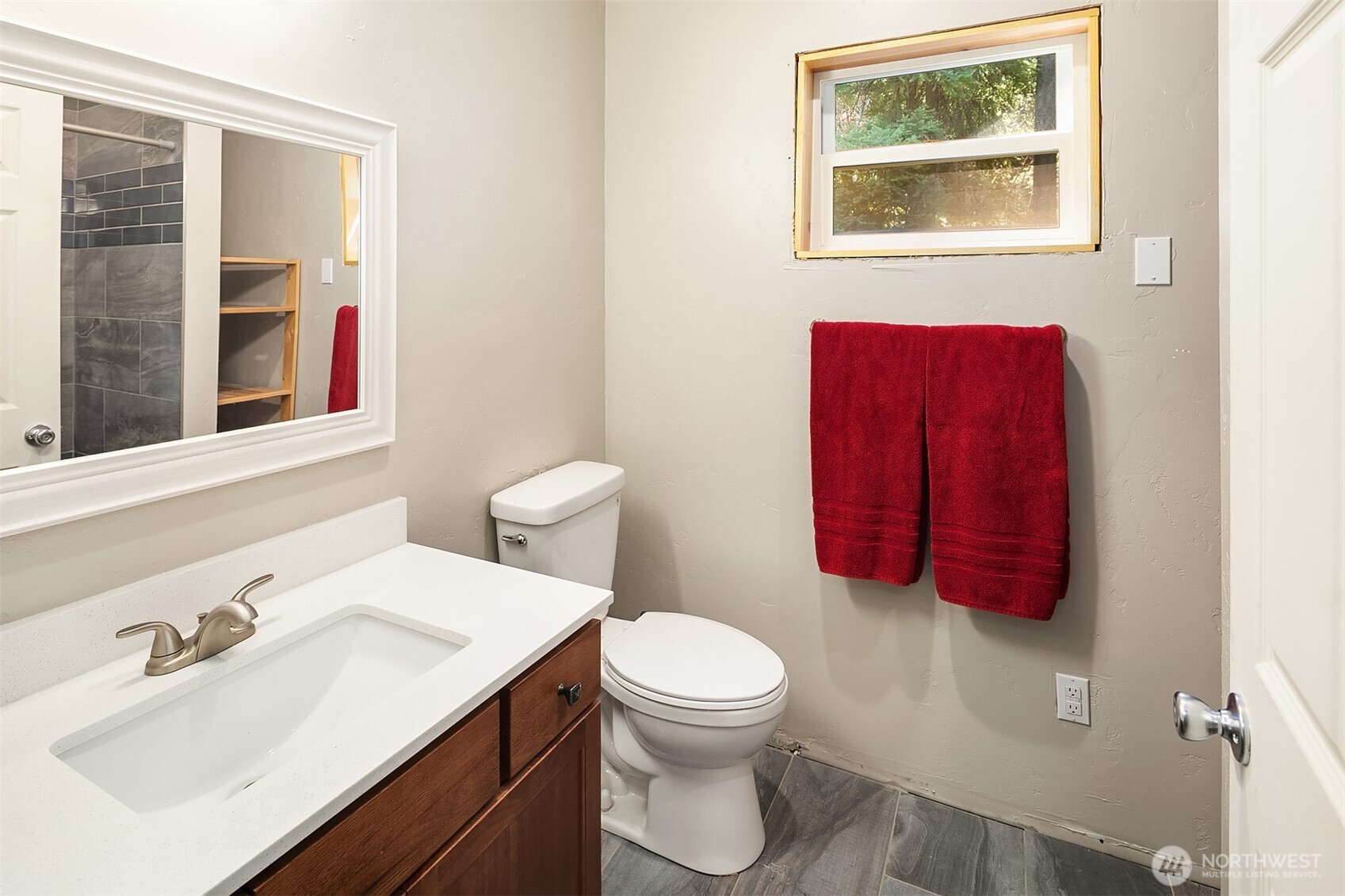 61 Tom And Nita Road Cle Elum, WA 98922 - Photo 13 of 27 a bathroom with a sink toilet and mirror