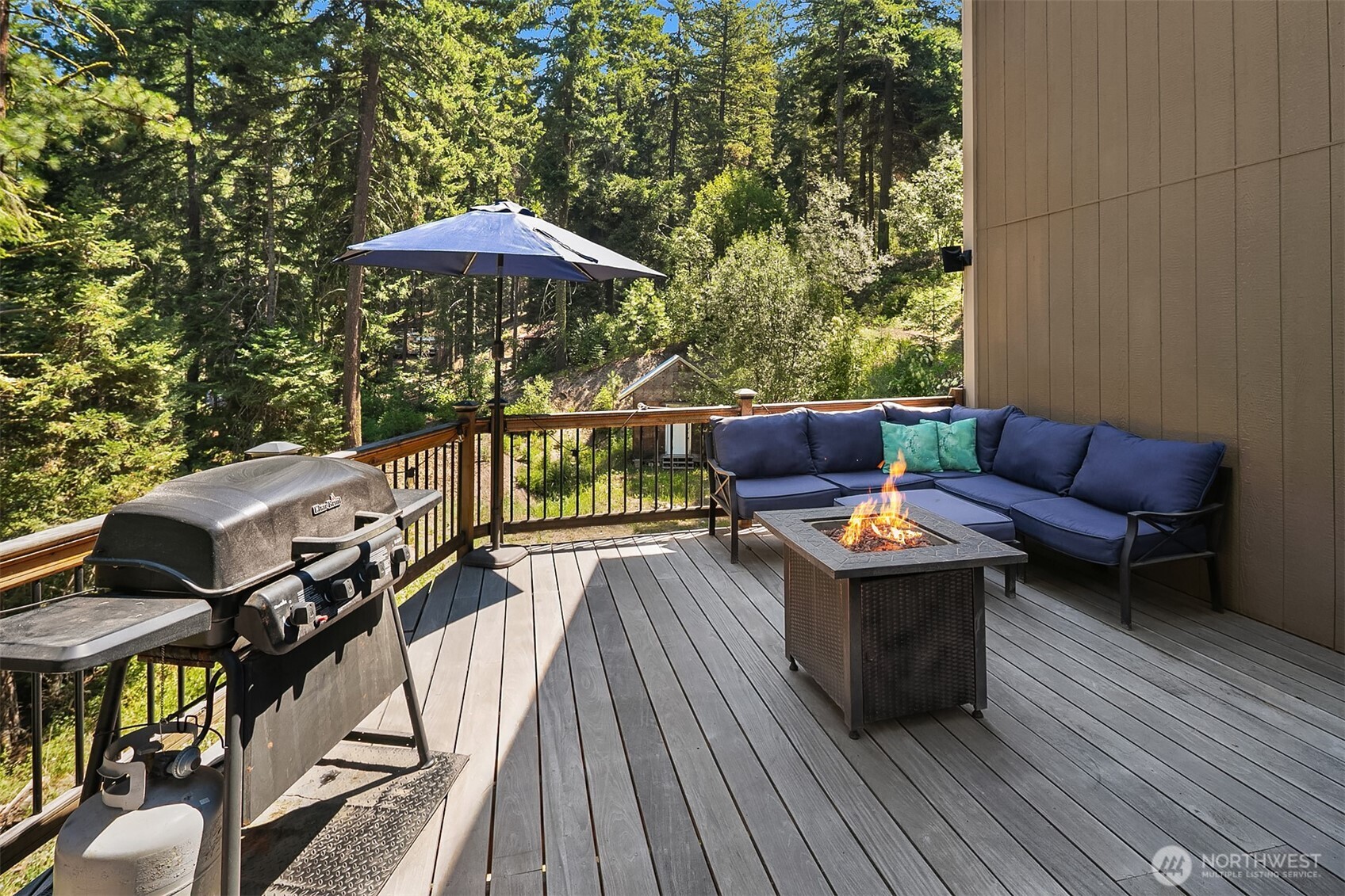 61 Tom And Nita Road Cle Elum, WA 98922 - Photo 17 of 27 a view of a balcony with furniture and wooden floor