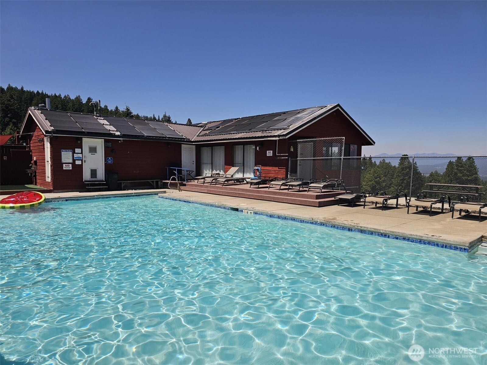 61 Tom And Nita Road Cle Elum, WA 98922 - Photo 5 of 27 a front view of a house with patio