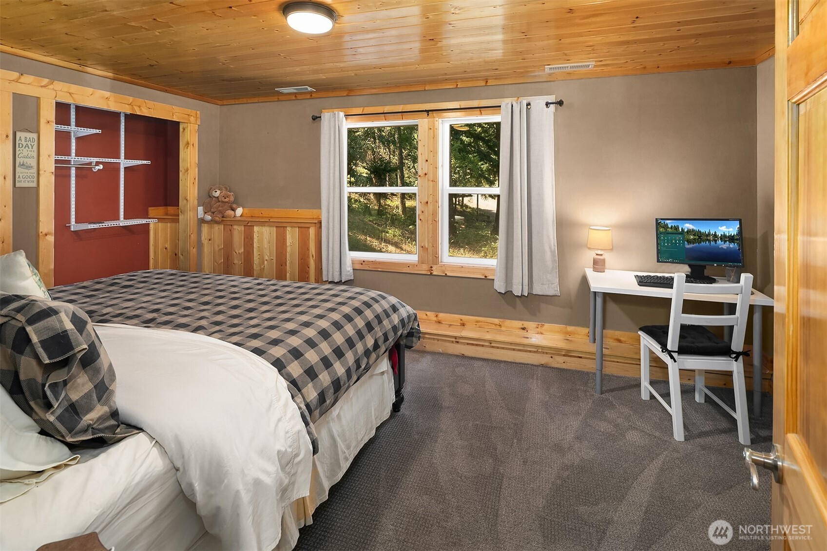 61 Tom And Nita Road Cle Elum, WA 98922 - Photo 10 of 27 a bedroom with a bed and a cabinets