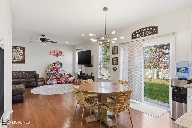 a bedroom with bed and window
