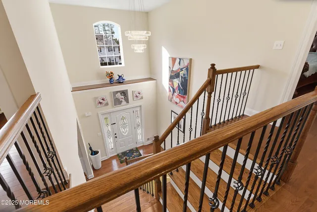 a front view of house with a garden and patio
