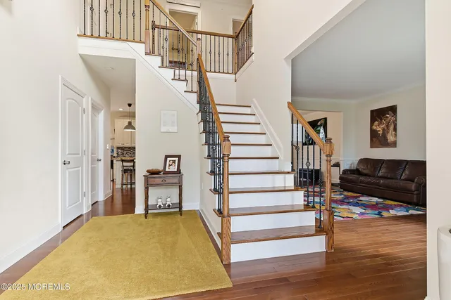 a view of a hallway with an entryway