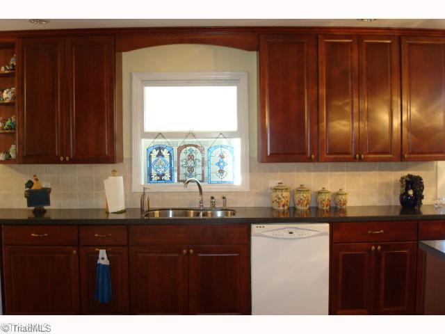 1505 Cardiff Lane High Point, NC 27265 - Photo 10 of 13 Kitchen. Looking into the sunroom