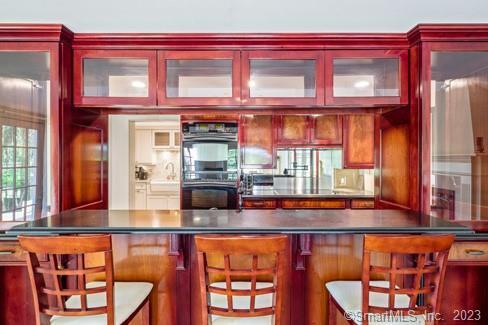 45 Calhoun Street Washington, CT 06794 - Photo 12 of 29 a picture of a red brick building with large windows