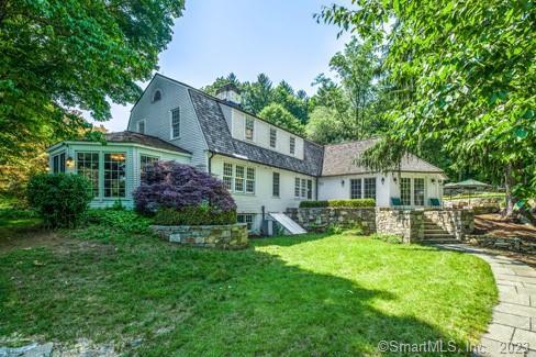 45 Calhoun Street Washington, CT 06794 - Photo 2 of 29 a front view of a house with garden