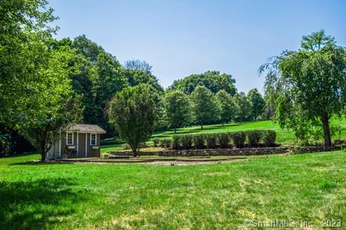 45 Calhoun Street Washington, CT 06794 - Photo 26 of 29 a front view of a house with garden