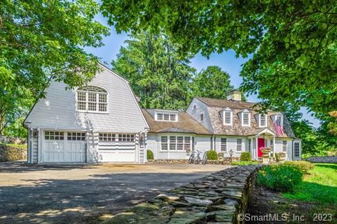 45 Calhoun Street Washington, CT 06794 - Photo 27 of 29 a view of a house with a garden and trees