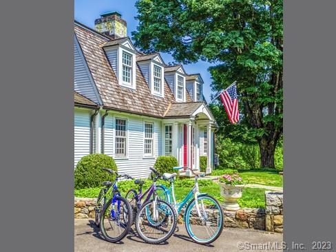 45 Calhoun Street Washington, CT 06794 - Photo 29 of 29 a front view of house with a yard and a table
