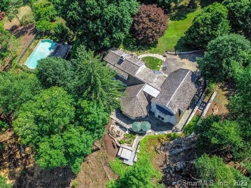 45 Calhoun Street Washington, CT 06794 - Photo 5 of 29 an aerial view of a house with a yard and large trees