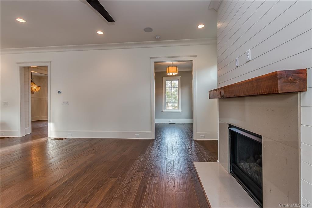 748 Ellsworth Road, Unit 47 Charlotte, NC 28211 - Photo 12 of 34 an entryway at livingroom with furniture and wooden floor