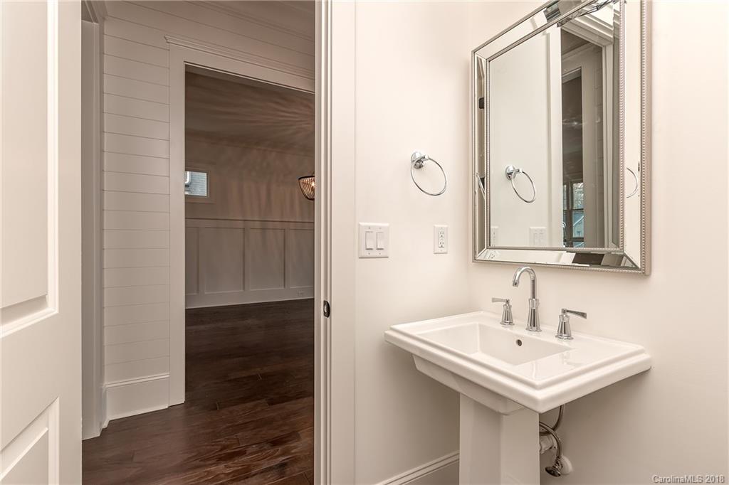 748 Ellsworth Road, Unit 47 Charlotte, NC 28211 - Photo 15 of 34 a bathroom with a sink and a mirror
